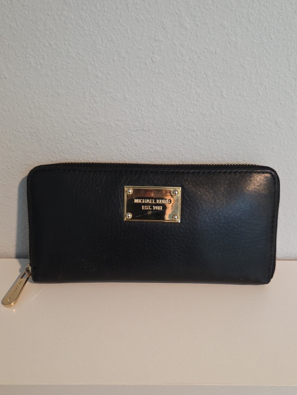 Michael Kors Black Leather Zip Wallet with Gold Plaque